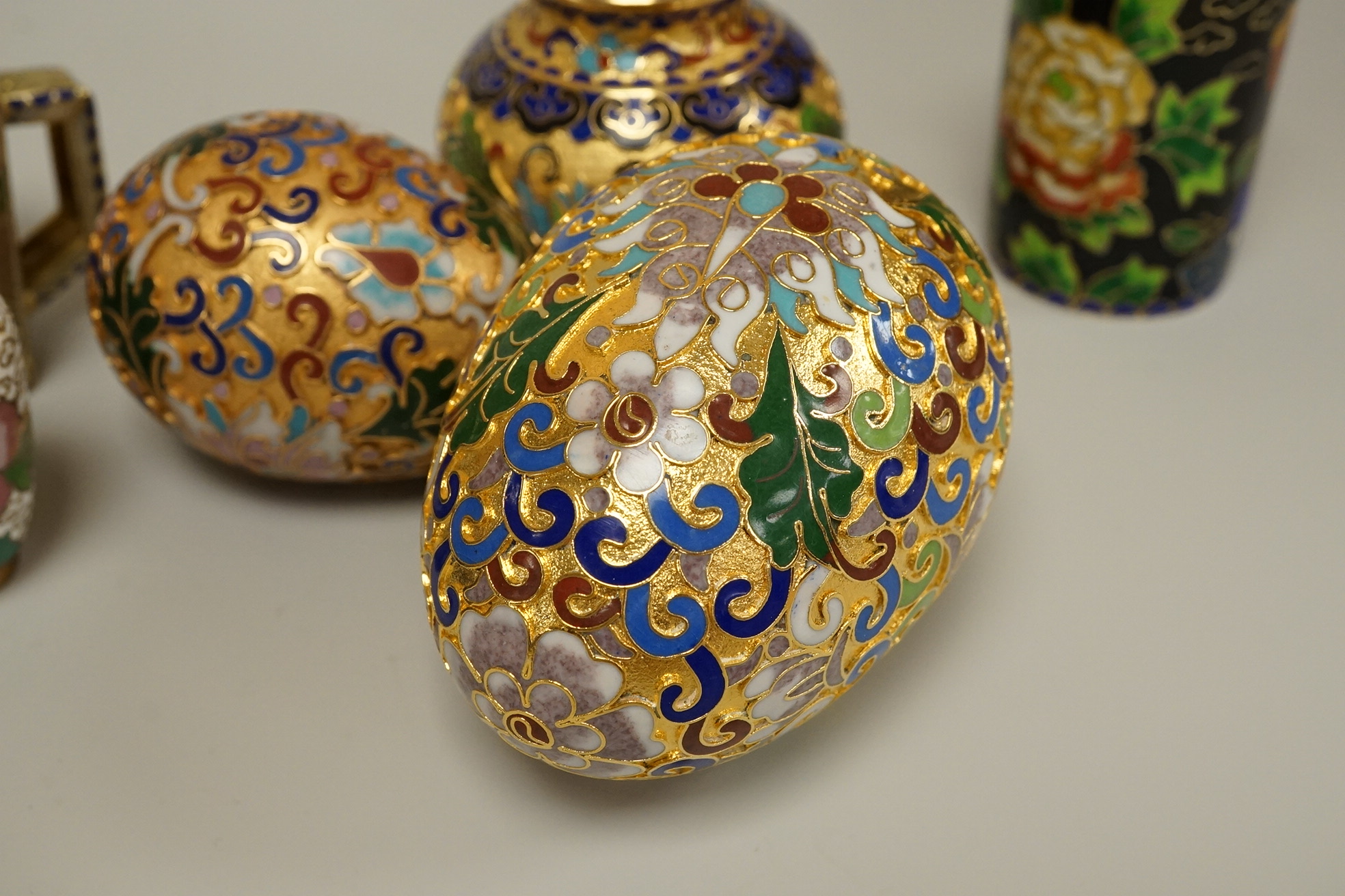 A collection of miniature enamel and cloisonné boxes, eggs and a painted rabbit, etc. (11)